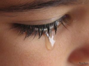 woman with a tear